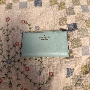 kate spade New York Roulette Slim Bifold Tiffany Pebbled Leather Zip Wallet
